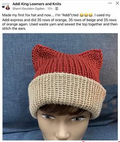 a knitted hat on top of a mannequin head