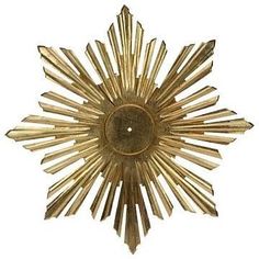 a gold sunburst is shown against a white background