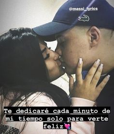 a man and woman kissing each other in front of a white background with the caption