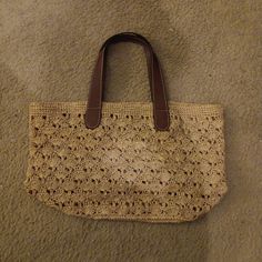 Gorgeous New Brighton 12"X20" Woven Raffia Shoulder Tote Handbag. Great Shopping Buddy. This Brighton Shoulder Tote Handbag Is A Must-Have For Any Fashion-Forward Woman. The Bag Features A Beautiful Woven Raffia Exterior In A Cream Color That Adds A Touch Of Elegance To Any Outfit. Measuring 12" X 20", It Offers Plenty Of Space For All Your Essentials. The Tote Comes Brand New Without Tags, Making It A Perfect Gift For Someone Special Or A Treat For Yourself. The Bag Is Designed With A Lovely Pa Eco-friendly Straw Bag For Shopping With Top Carry Handle, Designer Brown Satchel, Natural Color Satchel For Shopping, Straw Tote Bag With Handles, Elegant Crochet Jute Bag For Everyday Use, Rectangular Woven Satchel For Shopping, Large Bags With Braided Handles, Natural Color Shopping Bag With Top Carry Handle, Natural Color Shopping Bags With Top Carry Handle