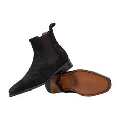 John Varvatos Amsterdam Men's Shoes Black Suede Leather Chelsea Boots (JV1002) Material: Suede Leather Hardware: None Color: Black Color Code: 237 Outer Sole:Leather Outsole Genuine Suede Leather Classic Chealsea Design Fabric Pulltab Handmade in Italy F3664Y3-AMSTERDAM-BLACK A Few Words from the Brand A classic chelsea boot with refined textures. The Amsterdam Boots are crafted from luxury suede using old-world techniques and craftsmanship. The suede is completed with a rapid stitch constructio Business Chelsea Boots With Leather Sole And Round Toe, Business Chelsea Boots With Branded Insole And Round Toe, Business Chelsea Boots With Suede Lining In Calf Leather, Classic Black Chelsea Boots With Suede Lining, Suede Chelsea Boots With Leather Sole For Business, Luxury Chelsea Boots With Rubber Sole For Business, Calf Leather Slip-on Dress Shoes With Suede Lining, Formal Goodyear Welted Suede Chelsea Boots, Classic Suede Chelsea Boots With Moc Toe