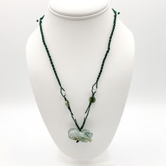 This is a high grade jadeite jade pendant necklace. It is exquisitely hand carved, so each pendant is different in some way. The pendant is completely natural jade, un-dyed and in its natural form. The pendant is carved in the form of the Chinese Zodiac - Ox. The necklace is adjustable - one size fits all. It comes with a gift box. The item is hand carved and natural so it may have imperfections because of the nature of stone or the carving - part of the charm of carved jade! Pictures are of the Handmade Jade Necklaces For Good Luck, Adjustable Jade Necklace For Good Luck, Adjustable Jade Pendant Necklace, Adjustable Jade Necklace, Carved Jade Pendant Jewelry, Adjustable Green Carved Necklace, Adjustable Green Carved Necklaces, Carved Jade Pendant Necklace, Carved Jade Jewelry For Good Luck