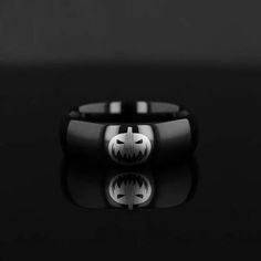 This Halloween, enhance your look with this specially-engraved domed Black Tungsten Wedding Band. Made of durable black tungsten, this domed ring features a large pumpkin engraving for a fun Halloween twist!. The polished finish provides a sleek, bold look. This Halloween-themed ring features a pumpkin engraving Includes Thorsten Lifetime and Lifetime Sizing Warranty (excluding re-engraving) Available in 4mm, 6mm, 8mm, 10mm, and 12mm widths for couples who want a matching set This domed ring fea Pumpkin Engraving, Black Tungsten Wedding Band, Large Pumpkin, Black Tungsten Rings, Tungsten Wedding Band, Halloween Jack O Lanterns, Black Tungsten, Tungsten Carbide Rings, Halloween Jack