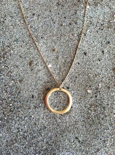 This beautiful necklace has a 25mm matte gold plated circle on a 14K gold filled chain with a 14K gold filled clasp. Simple and elegant. Will go with everything!Shown in 18" length,but can be made as a long layering necklace also. Please choose length above. Also available in silver as shown in the last photo and can be found at:https://www.etsy.com/listing/151316161/silver-necklace-circle-pendant-sterling?ref=listing-2*If you are unsure of the length you need, or would like to wear this item at Matte Gold Jewelry Gift, Gold Minimalist Open Circle Necklace, Minimalist Gold Open Circle Necklace, Hypoallergenic 14k Gold-filled Round Necklace, Hypoallergenic 14k Gold Filled Necklaces, Hypoallergenic 14k Gold-filled Necklace, Gold Full Circle Necklaces With Adjustable Chain, Gold Full Circle Necklace With Adjustable Chain, Gold Open Circle Necklace