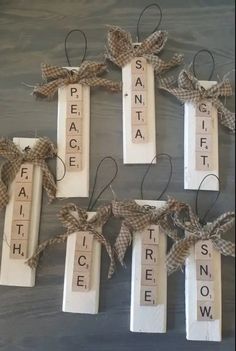 wooden scrabbles with words spelling peace and snow on them