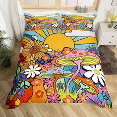 a bed with colorful flowers and plants on it