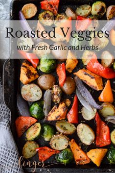 roasted vegetables in a baking pan on a table