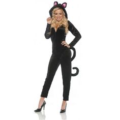 a woman in a cat costume posing for the camera