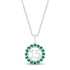 Make her May birthday even more memorable with this celebratory Quincea±era necklace. Crafted in sterling silver, the number 15 shines within a halo of bright round lab-created emeralds. The pendant sways from an 18-inch cable chain that secures with a lobster clasp. Quinceanera Necklace, Number 15, May Birthday, Lab Created Emerald, Accessories Jewelry Necklace, Birthstone Necklace, Quinceanera, Spring Rings, Cable Chain