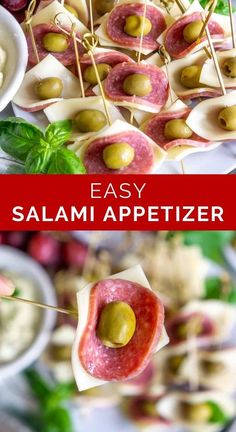 an appetizer with olives and ham on skewers