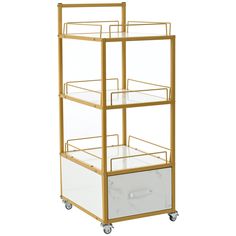 a gold and white cart with drawers on wheels