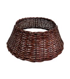 a brown wicker basket on a white background