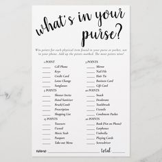 what's in your purse? game card with black ink on white marble background