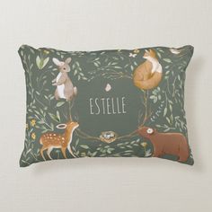 an animal themed pillow with the name estelle