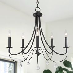 Incorporate a modern sense into your living space with this uniquely Matte Black with Branch Candlestick Black Modern/Contemporary Chandelier Light by Uofin Lighting, safely rated for dry locations. The 6-Light farmhouse chandelier from artistic flair is introduced to minimalism. Each open silhouette makes a sculptural statement, all with an added texture of a rustic finish as well as looped accents. A bucolic motif blends with traditional design in all structures for a versatile aesthetic. The Chandelier Store, Iron Ceiling, Big Room, Branch Chandelier, Farmhouse Chandelier, Transitional Wall Sconces, Candle Style Chandelier, Cool Floor Lamps, Metal Chandelier