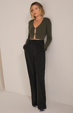 These wide-leg trousers are fashioned from smooth woven fabric and gently pleated at the waist to further the flowy fit. 30" inseam; 22" leg opening; 13 1/2" front rise; 17 1/2" back rise (size 8) 63% polyester, 32% rayon, 5% elastane Machine wash, line dry Imported 90s Minimalism Fashion, Daughter Black, Work Chic, Suiting Fabric, Favorite Daughter, Jumpsuit Trousers, All Black Outfit, The Favorite, Wide Leg Trousers