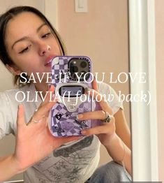 a woman taking a selfie with her cell phone in front of the mirror that says save it you love ollivia follow back