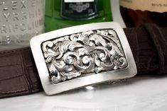 Mason Dufrene - AXEL'S Luxury Men's Semi-formal Belt Buckles, Luxury Belt Buckles For Men, Luxury Masculine Belt Buckles For Formal Occasions, Luxury Silver Belts With Metal Logo, Luxury Business Belts With Silver Buckle, Luxury Business Belt Buckles, Luxury Classic Engraved Belts, Luxury Masculine Belt Buckles For Formal Wear, Luxury Silver Belt For Men