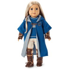 a doll with blonde hair wearing a blue coat