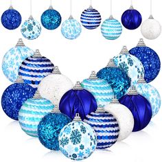 blue and white christmas ornaments are arranged in the shape of an ornament with snowflakes on them