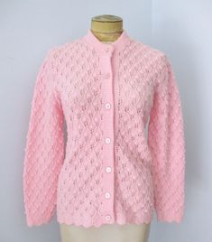 Wweet vintage 1980's or 90's pastel pink wavy textured pineapple striped cardigan sweater from Parkway Knits. Light to medium weight, super soft, 100% Wintuck Orlon Acrylic. Features scalloped edges on cuffs and bottom edge. APPROXIMATE MEASUREMENTS in inches - lying flat Size:  Unknown, likely Small to Medium Shoulder to shoulder:  17 Sleeve, from shoulder:  22 Chest, armpit to armpit:  17 Waist:  17 Length, center back:  25 CONDITION Very good to excellent vintage condition with minimal wear. 80s Fashion Pastel, Retro Crew Neck Cardigan For Spring, Vintage Fitted Knitted Sweater, Fitted Vintage Knitted Sweater, Vintage Pink Sweater For Fall, Fitted Vintage Knitted Cardigan, Spring Vintage Pink Sweater, Pink Button-up Knit Sweater, Pink Vintage Winter Cardigan