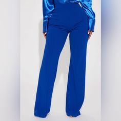 Elevate Your Work Wardrobe With These Stunning Victoria High-Waisted Dress Pants From Fashion Nova. Crafted From Premium Quality Materials, These Pants Are Designed To Offer Exceptional Comfort And Style. The Pants Feature A Flattering Fit That Accentuates Your Curves And Flatters Your Figure, While The Blue Color Adds A Touch Of Sophistication To Your Look. With A Regular Size Type And S Size, These Pants Are Perfect For Women Who Want To Make A Statement At Work Or Any Formal Occasion. The Pan Fitted Dress Pants For Party, Fitted Dress Pants With Pockets For Party, Fitted Elastane Dress Pants For Summer, Fitted Solid Color Bottoms For Work, Fitted Workwear Bottoms In Solid Color, Blue High-waisted Bottoms For Office, Blue High Waist Bottoms For Office, High Waist Blue Dress Pants For Office, Full-length Dress Pants For Party