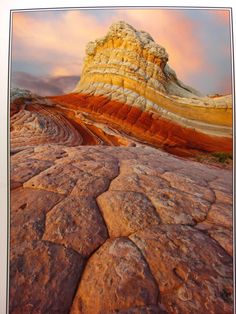 the rock formations are painted with different colors