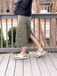 The Callen Cargo Skirt is the perfect blend of casual and chic, ideal for any adventure that comes your way. The cargo-style pockets add a playful twist. This skirt is the epitome of cool, making it the ultimate choice for fun and fashionable days ahead! Item Details: Midi Length Cargo Pockets Button Waist Closure Belt Utility Cargo Skirt With Multiple Pockets In Khaki, Utility Cotton Cargo Skirt, Trendy Fall Skirt With Pockets, Utility Cargo Skirt With Pockets In Khaki, Utility Style Khaki Cargo Skirt, Khaki Utility Cargo Skirt With Side Pockets, Khaki Cotton Cargo Skirt With Multiple Pockets, Khaki Cotton Cargo Skirt With Side Pockets, Casual Cargo Skirt For Spring