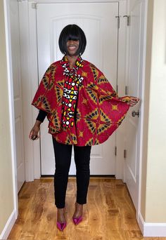 This beautiful african cape is a beautiful fashion accessory that can be worn to make a fashion statements in a variety of ways. This cape be worn as a cape on any solid print or pant. It can also be worn as train on any pant and accessorized to give a chic look. This african cape is ready to ship. Red One Size Cape Poncho, Red One-size Cape Shawl, Red One-size Cape Poncho, Red One-size Poncho Cape, Multicolor Cape Shawl One Size, Multicolor Shawl Cape One Size, One Size Multicolor Shawl Cape, Multicolor One-size Shawl Cape, Red One Size Cape