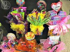 candy and candies are on display in a basket for someone's birthday party