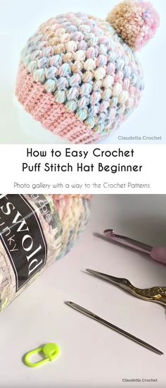 the crochet hat is next to scissors and other crafting supplies on a table