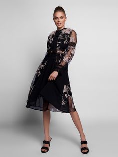 Composition: Cotton, Polyester Washing instructions: Hand Wash cold Model is wearing size S Designer Style ID: GC101-42356 Floral Embroidery Midi Dress For Night Out, Floral Embroidered Midi Dress For Night Out, Midi Length Floral Embroidery Dress For Night Out, Chic Floral Embroidery Midi Dress For Fall, Chic Fall Midi Dress With Floral Embroidery, Black Chiffon Midi Dress For Cocktail, Black Chiffon Evening Dress For Spring, Black Sheer Dresses For Spring, Black Dresses With Sheer Sleeves For Spring