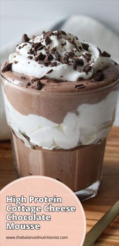 high protein cottage cheese chocolate mousse with whipped cream and chocolate shavings