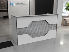 the reception desk is white and has an interesting pattern on it's front panel