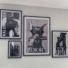 three framed pictures hang on the wall next to each other, with black and white photos above them