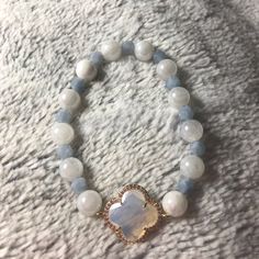 Natural Moonstone With Pearlized Coating Makes For Stunning Flashy “Pearls”! Accented With Aquamarine Stones And A Goldtone Opalite Clover. Bundle Items To Save On Shipping Aquamarine Stone, Aquamarine, Stretch Bracelets, Womens Jewelry Bracelets, Moonstone, Gold Tones, Blue And White, Women Jewelry, Stone