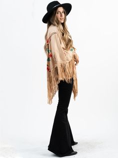 Product details: Fringe Poncho Aztec steer skull print Soft and comfortable One size fits most Full Length approximately 31" 90% Polyester 10% Spandex Casual One Size Poncho With Fringe, Casual One-size Poncho With Fringe, Casual Poncho With Tassels For Festivals, Casual Festival Poncho With Fringe, Fall Festival Oversized Poncho, Oversized Fall Festival Poncho, Casual One Size Poncho For Festivals, Casual One Size Festival Poncho, Skull Collection