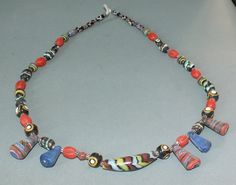 This necklace with different colorful handmade glass beads originates from Thailand. The hanging length of the strand is 33 cm. The diameter of the beads is 0.5 cm to 1.5 cm. The beads are up to 4.6 cm long. Its weight is 90 gram. (e23) SHIPPING SHIPMENT is FREE. All items are shipped within three working days after receipt of payment. We send everything by registered airmail. Insured packets (over 50 cm length / over 1500 gram) I send by standard way. PAYMENT Paypal is preferred. RETURN POLICY: NO RISK: Any item may be sent back within 14 days. As soon as the item arrives I return your payment. If you have any question, please contact me! Jade Amulet, Amulet Charm, Handmade Glass Beads, Chain Styles, Colored Glass, Over 50, Return Policy, Glass Beads, Thailand