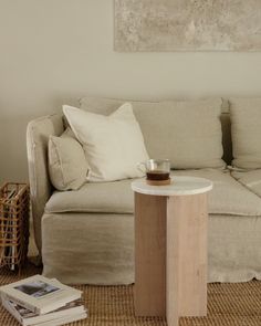 a living room with a couch and table in it