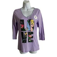 Disney Sleep Shirt Juniors Size M Purple Tinker Bell Long Sleeve V-Neck New New With Tags Size: Juniors Medium Measurements: 17" Armpit To Armpit, 25" Length From A Smoke Free Home Disclaimer: The Color Of The Item Might Be Slightly Different Than It Appears In The Pictures Because Of Lighting. Please Take This Into Consideration When Buying. Thank You! Cute V-neck Loungewear Tops, Cute V-neck Tops For Loungewear, Cute Character Print Tops For Loungewear, Cute Tops With Character Print For Loungewear, Disney Cotton Tops, Cute Purple Tops For Loungewear, Disney Cotton Tops For Spring, Christmas Pajama Bottoms, Disney Pajama Pants