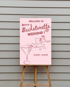 a welcome sign for betty's bachelor weekend is displayed on an easel in front of a house