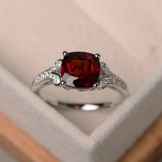 This ring features a 8*8mm cushion cut natural garnet and sterling silver finished with rhodium. Customization is available. It is made by hand, and it will take about 7 days to finish the ring after your payment is completed. Main stone: natural garnet Morganite weight: Approx2.71 ct Metal type: sterling silver finished with rhodium Accent stone: cz Customization is available, I also can make it with 14k solid gold (white or yellow or rose) and diamond accent stone, just feel free to contact me Aquamarine Engagement Ring Rose Gold, Morganite Engagement Ring Rose Gold, Ruby Anniversary, Pink Morganite Engagement Ring, Rose Gold Engagement Ring Vintage, Rose Gold Diamond Ring Engagement, Gold Diamond Wedding Band, Aquamarine Engagement Ring