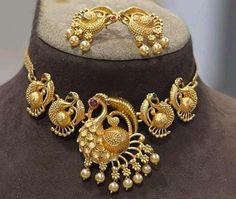 Material:- Gold Plated, Alloy Stone Type:- Pearls, Kundan These Beautiful Bridal Jewelry Set Best for gifting and personal use, You can gift your Girlfriend, Mother, Sister , Relatives , Neighbours etc. Combine it with Matching Dress and be the Limelight of every Occasion ( Diwali, Birthday, Anniversary, Christmas, Any Ritual Festival). Suitable for all Occasions. a)These are very skin Friendly. b)The plating is Non- Allergic and safe for all Environment. Gift for Her, Best Friend Gift, Gift Ideas, Valentines Day Gift,Teacher appreciation Gift, Girl Friend Gift, Friendship Gift, Teacher Gift, Mother's day Gift from Daughter, Christmas Gift, Engraved, Gift for Her, Anniversary Gift for Wife, Anniversary Gift for Girlfriend, Valentines Day Gift for Him, Birthday Gift for Him, Graduation Gift Gold Jewelry Sets With Peacock Design For Festivals, Gold Jewelry With Peacock Design For Festivals, Peacock Design Bridal Necklace For Festivals Gift, Peacock Design Bridal Necklace For Festivals, Multicolor Peacock Design Jewelry Gift, Festive Bridal Necklace With Peacock Design, Gold Peacock Design Necklace, Round Jewelry Sets With Peacock Design, Gold Jewelry Sets With Peacock Design