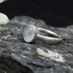 Stacking Moonstone Ring- Sterling Silver Ring- Rainbow Moonstone Ring - Moonstone Jewelry- Bezel Ring-White Labradorite Ring -Stacking Ring 》D E T A I L S《 ✦Gemstone : Rainbow Moonstone ✦Metal : 925 Sterling Silver ✦Gemstone Size : 7 x 5 MM Approx ✦Weight : 3 Gram Approx ❣❣ Handmade Item ❣❣ **This ring is made to order** 》G EM S T O N E D E T A I L《 **Gemstone structure may vary from the image as two gemstones do not have the same structure** If you want to see the picture of gemstone, then feel Celestial Style White Moonstone Birthstone Ring, White Stackable Moonstone Rings With Ethical Gemstones, White Birthstone Ring In Moon Shape, Minimalist Moonstone Ring For Healing, White Moon Shaped Ring With Birthstone, Celestial White Moonstone Ring As Birthstone, Healing Minimalist Moonstone Ring, Celestial Style Stackable Moonstone Ring, White Moonstone Rings With Bezel Setting