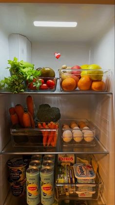 an open refrigerator filled with lots of food