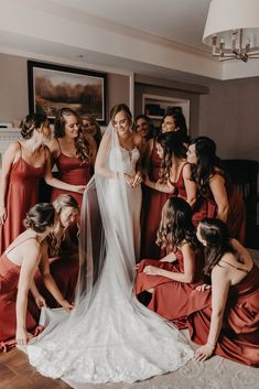 the bride and her bridesmaids are getting ready for their wedding