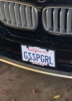 a black car with a license plate on it's front grill and the words california is