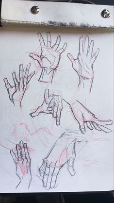 a drawing of hands on a piece of paper