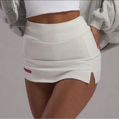 Size M With Built-In Shorts Nwt Sporty White Short Length Bottoms, Sporty White Short-length Bottoms, Sporty White Short Bottoms, Sporty White Shorts With Short Inseam, White Short Length Sportswear Bottoms, Trendy White Fitted Skort, Casual White Skort, White Short Sportswear Bottoms, White Athleisure Shorts For Spring