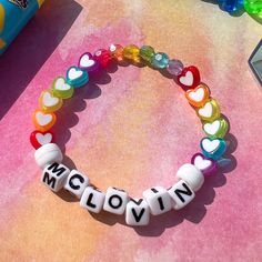 mclovin bead bracelet 🌈🌺 details ❥ approximately 6.5 inches & super stretchy 🐛 ❥ can be adjusted to your sizing :) 🌈 ❥ want this same design but want it to say something else? i can do that ❤️🔥 Multicolor Round Beads Kpop Jewelry, Personalized Multicolor Beaded Bracelets In Kpop Style, Personalized Multicolor Beaded Bracelets Kpop Style, White Rave Bracelets Gift, White Beaded Bracelets With Letter Beads Kpop Style, White Letter Beads Bracelet Kpop Style, White Kpop Beaded Bracelets With Letter Beads, White Beaded Kpop Bracelets, White Kpop Beaded Bracelets For Birthday